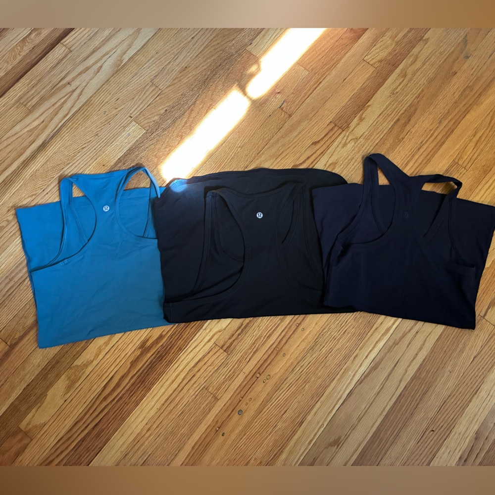 Lululemon athletica Teal Blue, Black with Mesh bottom, and Navy Blue. Size 4